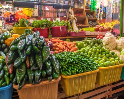 Fresh vegetables and fruits arranged in a local Mexican market